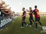Los jugadores del Extremadura celebran un gol.