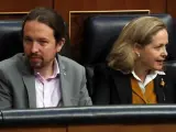 Nadia Calviño y Pablo Iglesias en el Congreso de los Diputados.