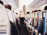 Pasajeros a bordo de un avión