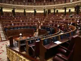 Miembros del Congreso sentados en el hemiciclo durante una sesi&oacute;n plenaria celebrada en el Congreso de los Diputados.