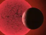 Recreación artística de la supertierra orbitando alrededor de la enana roja GJ 740