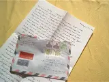 Imagen de una carta con su sobre.