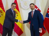 16 March 2022, Slovakia, Bratislava: Slovak Prime Minister Eduard Heger (R) shakes hands with Spanish Prime Minister Pedro Sanchez. Photo: Jakub Kotian/TASR/dpa 16/3/2022 ONLY FOR USE IN SPAIN