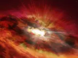 Impresión artística de un joven agujero negro en crecimiento que emerge del centro de una polvorienta galaxia con estallido estelar.