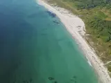 El misterioso monte español con bañeras naturales, ruinas de un castillo y vistas a una playa salvaje