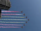 La Patrulla Águila dibuja la bandera de España en el cielo durante el desfile del Día de la Fiesta Nacional, este miércoles, en Madrid.