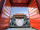 Red entrance gate opening to the forbidden city in Beijing - China