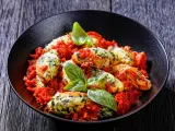 Malfatti de espinacas y queso ricotta con salsa de tomate