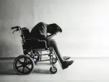 Una persona en silla de ruedas