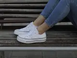 Zapatillas Converse de color blanco.