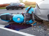 October 6, 2021, Riga, Latvia, damaged car and motorbike on the city road at the scene of an accident because of non-observance of distance