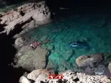 El coche caído al mar