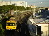 A suburban train leaves Santos train station in Lisbon, Wednesday, Nov. 9, 2022. (AP Photo/Armando Franca)