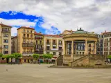 Pamplona, Spain - June 21, 2021: Historic Plaza del Castillo with restaurants and a central domed gazebo in Old Town, famous for running of the bulls
