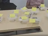 Envases encontrados por la Guardia Civil en Barajas con una quincena de tarántulas.