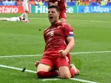 Serbia's forward #08 Luka Jovic celebrates after scoring his team's first goal during the UEFA Euro 2024 Group C football match between Slovenia and Serbia at the Munich Football Arena in Munich on June 20, 2024. (Photo by Miguel MEDINA / AFP)