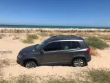 Coche atrapado en una duna en Valencia.