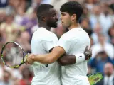Alcaraz y Tiafoe en Wimbledon.